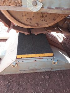 Lightweight excavator load platform pads